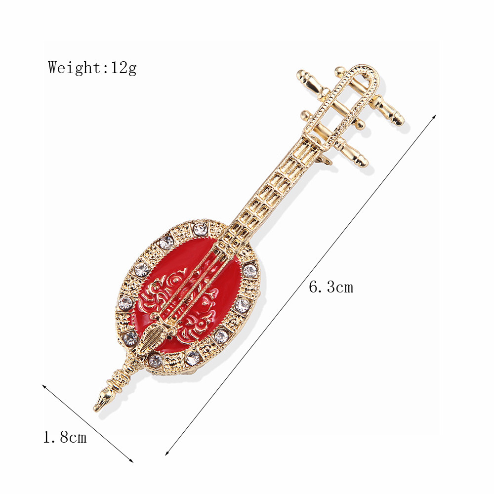 Antique Lute Red Enamel Brooch - огляд і ціна Suit Supply Wedding Party