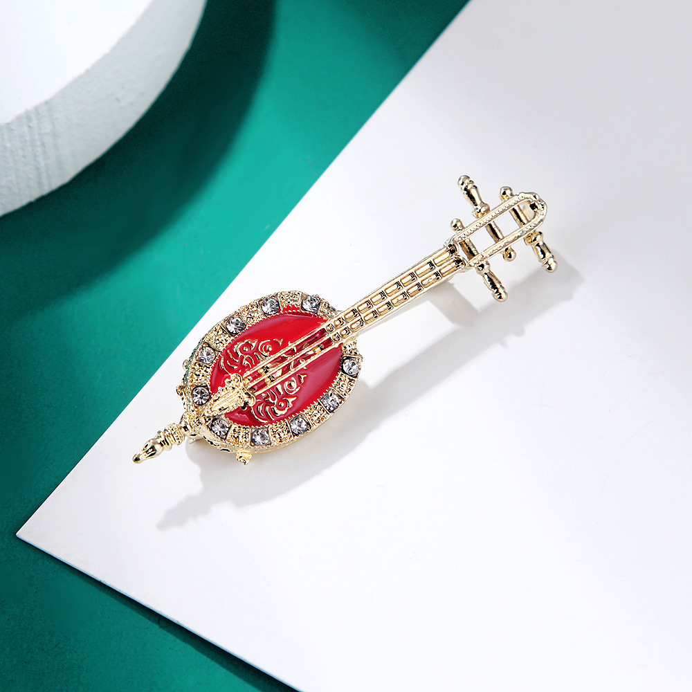 Antique Lute Red Enamel Brooch - огляд і ціна Suit Supply Wedding Party